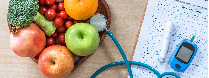 Fruits, vegetables, and a blood sugar tracking sheet