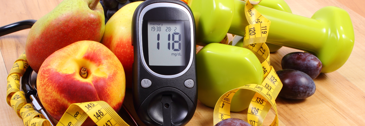 stethoscope, blood sugar meter, weight, and fruit
